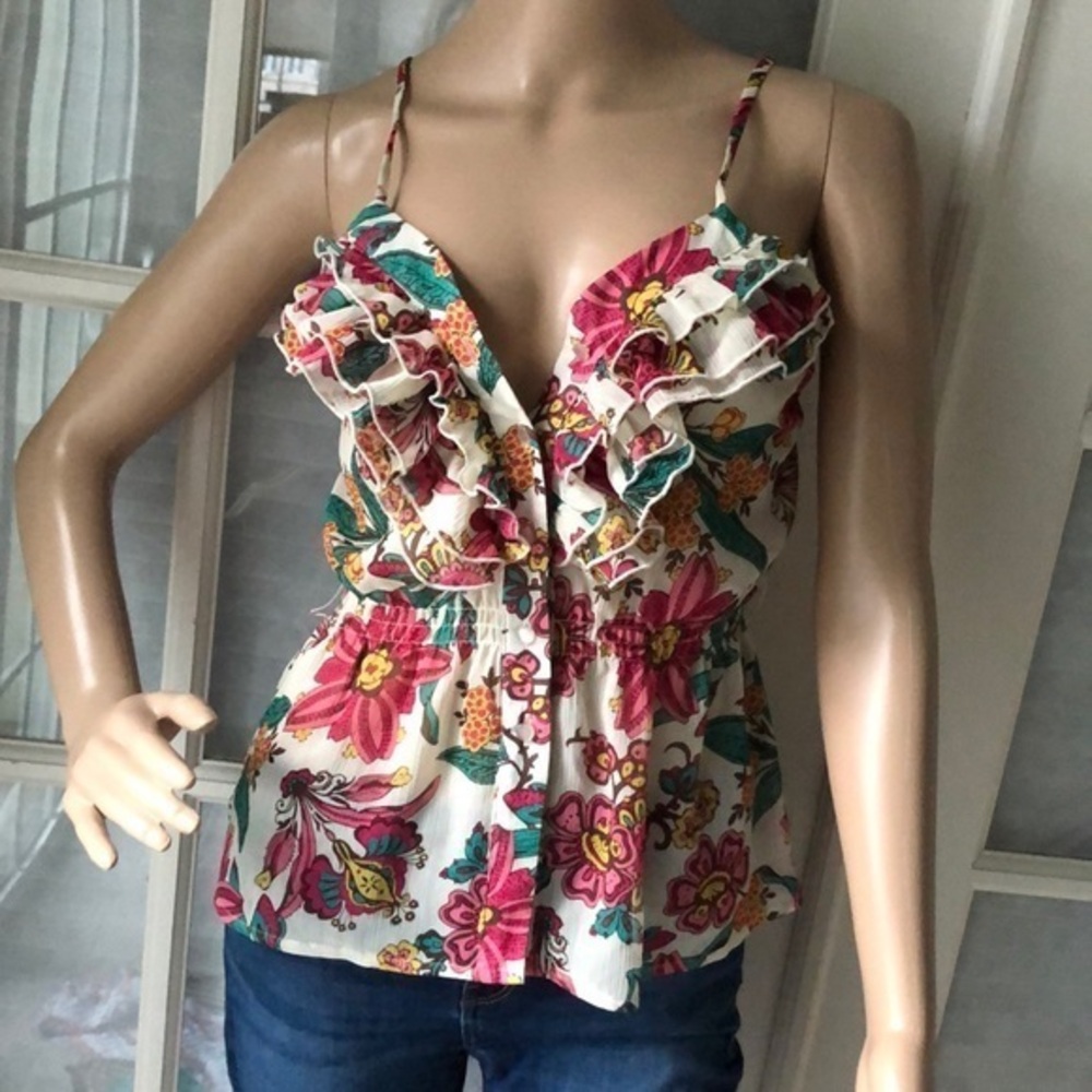 Feminine flirty sleeveless floral ruffle top